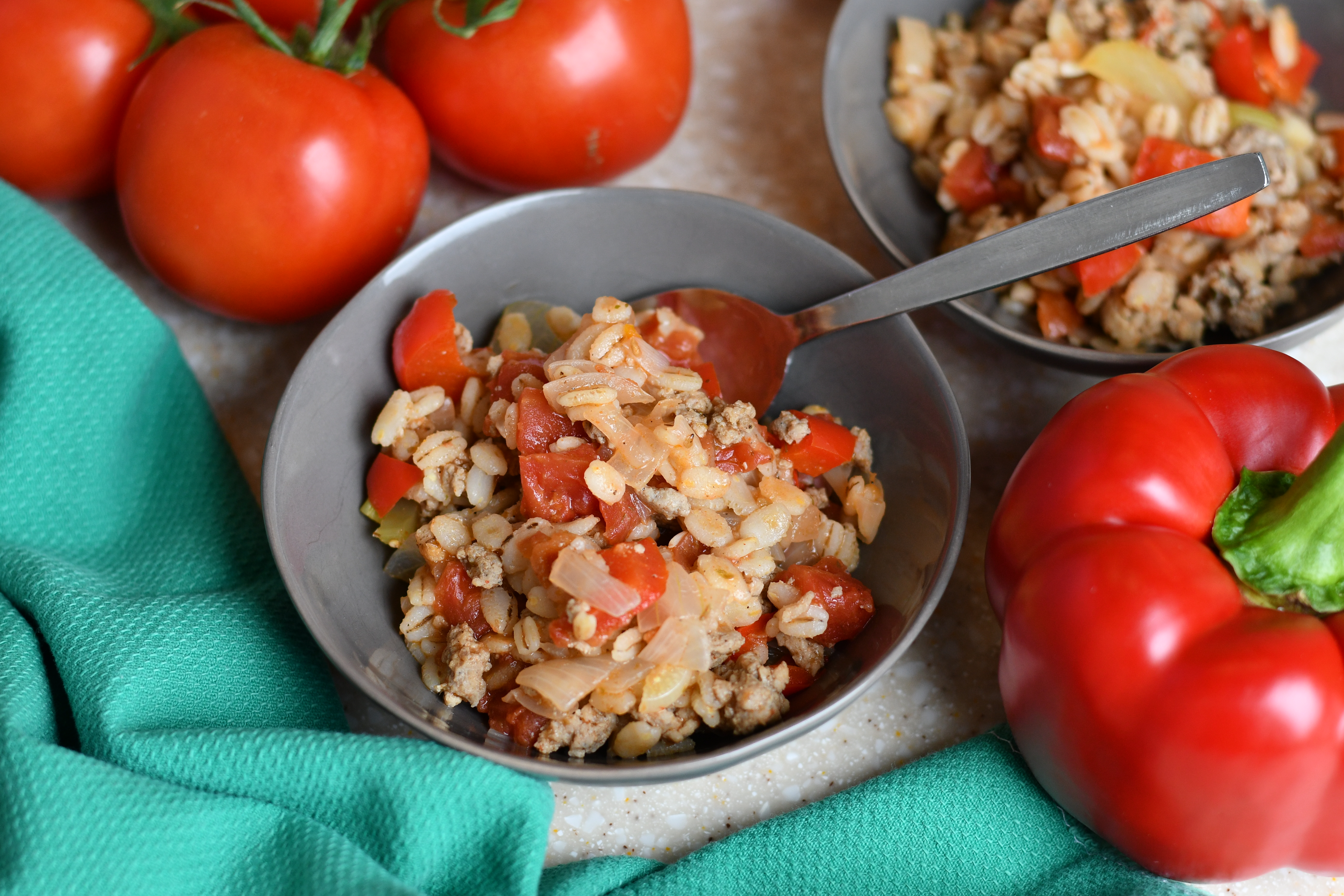 A photo of a bowl of food with a spoon