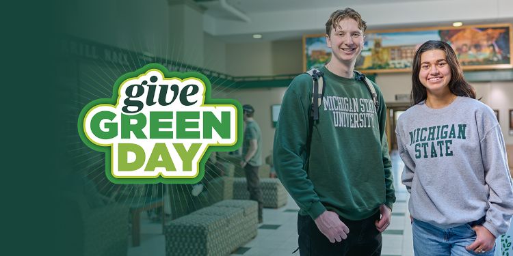 Image of smiling CANR students posing for a photo in the Ag Hall atrium. Image also include the Give Green Day logo.