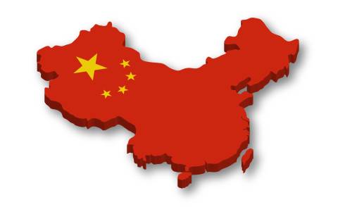 Graphic in the shape of China, solid red with the yellow stars of the People's Republic of China flag.