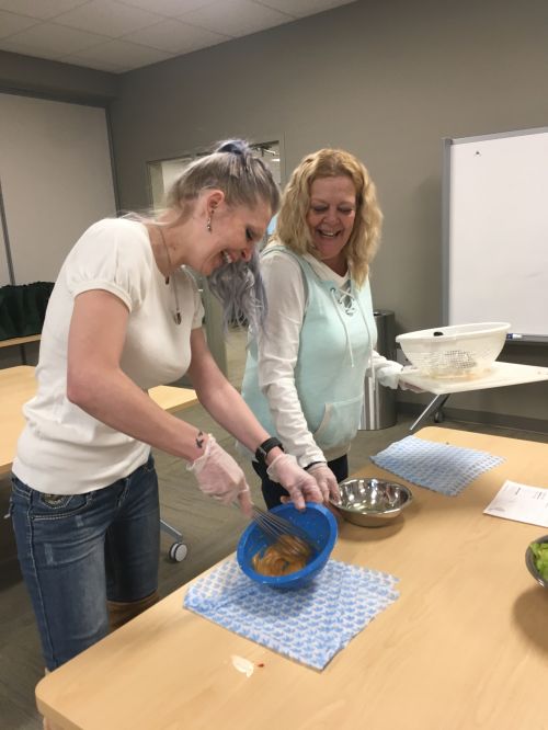 Participants in a Mason County Cooking Matters class prepare a new recipe. Photo credit Kendra Gibson 2018.