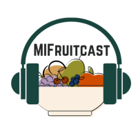 Bowl of fruit with headphones.