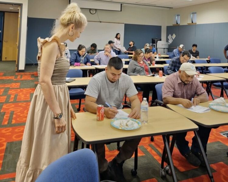 Eva Almenar, Ph.D., works with students in the Great Lakes Latina/o Farmers Program.