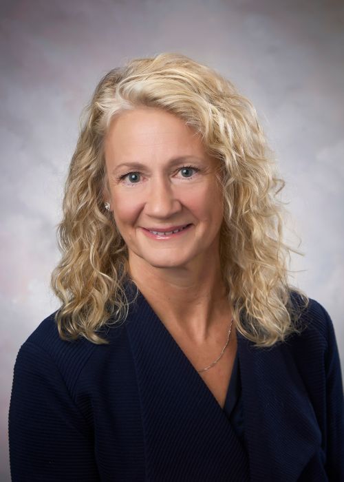 A headshot image of Michele Nikolai