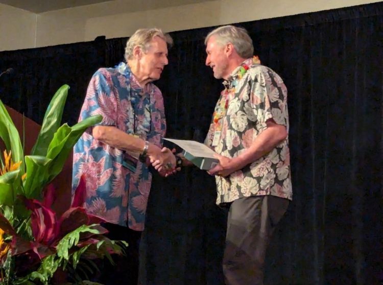 Dr. Baird accepts the award at the ASHS 121st Annual Conference from past ASHS president and Awards Committee Chair Dennis Ray.