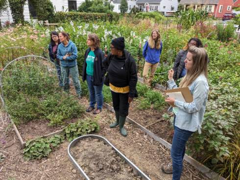 10 people on a tour of a flower farm