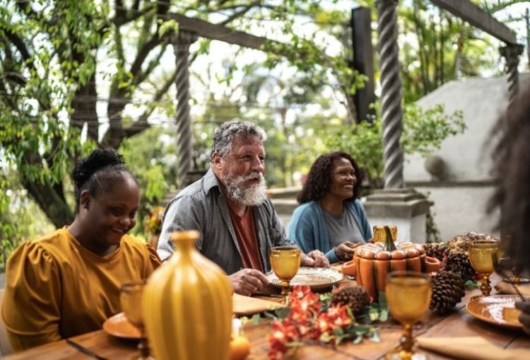 Family sitting around a table.