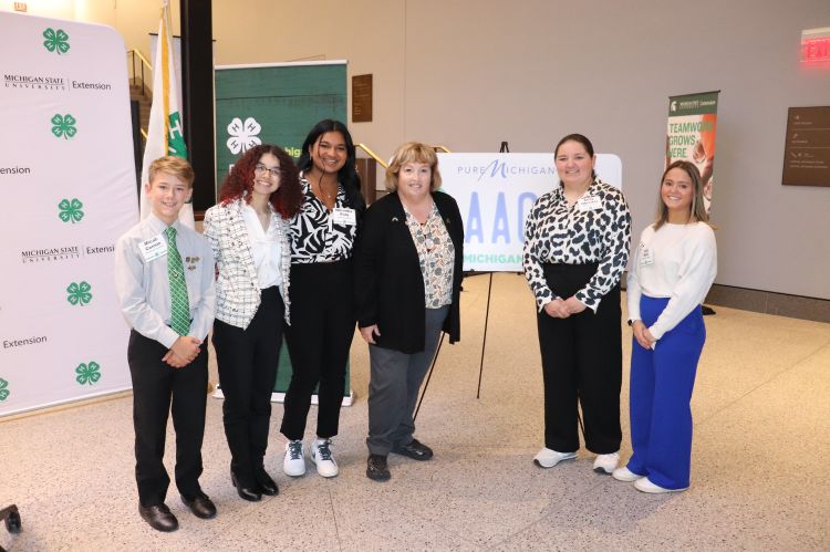 Michigan 4-H youth with legislative host State Rep. Reggie Miller (fourth from left) at Michigan 4-H Day at the Capitol.