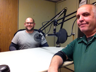 Adam Ingrao and Kraig Ehm sit and talk.