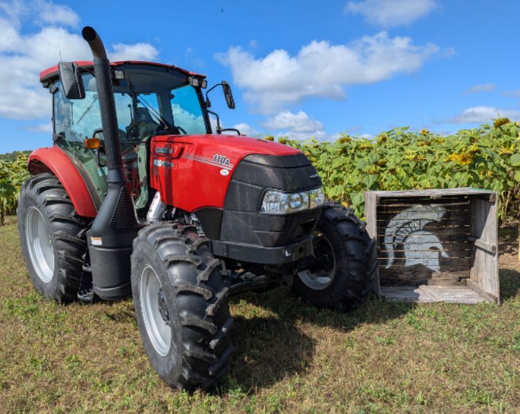 Case IH 110 Tractor parked at the MSU West Central Michigan Research and Extension Center (WCMREC) .