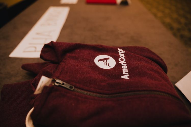 AmeriCorps red zip up hoodie