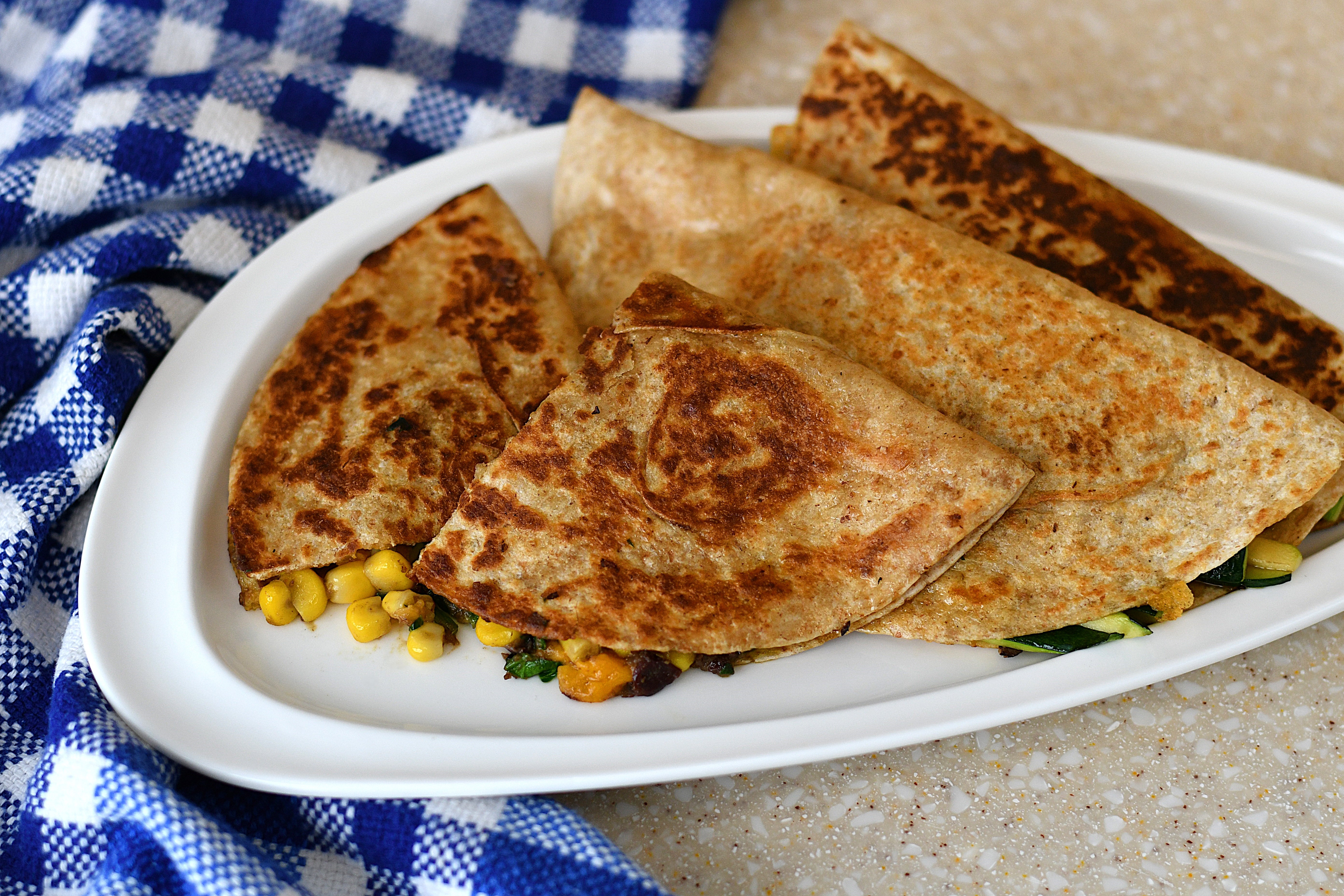 A photo of a plate of quesadillas