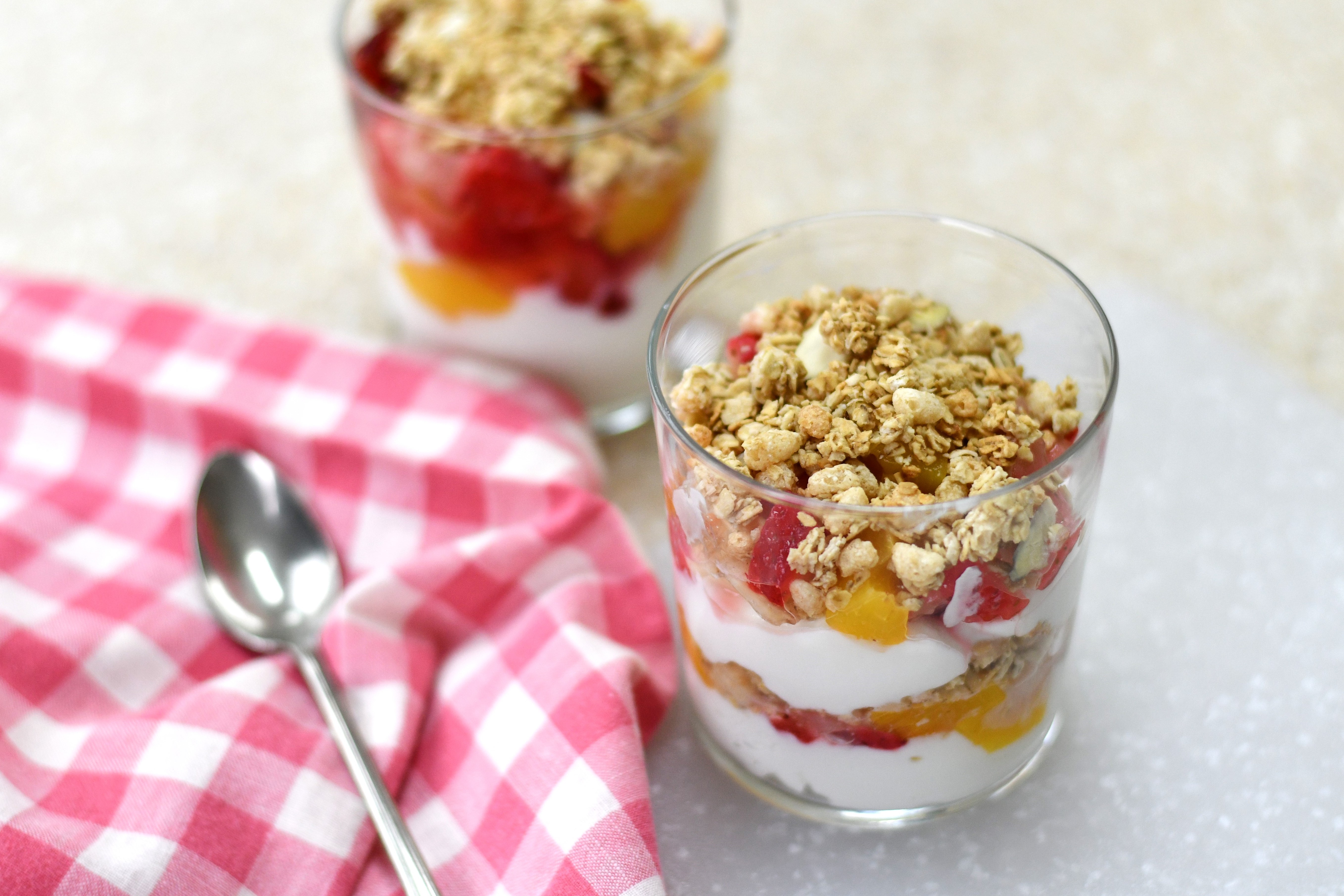 A photo of two yogurt cups