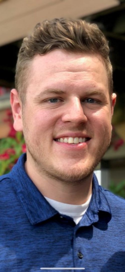 A headshot image of Kevin Cox