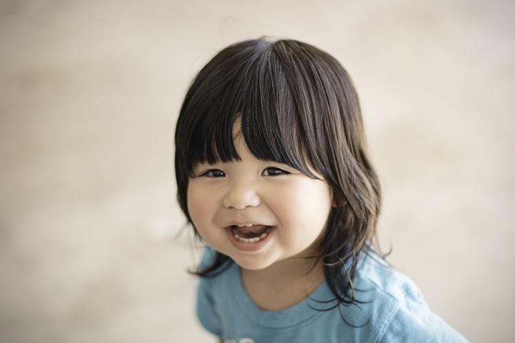Some children naturally have a happier mood, and other children may have a more serious mood. 