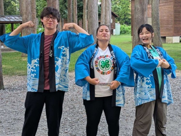 A Michigan 4-H exchange student with her host siblings.