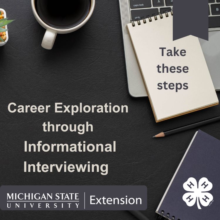 A cup of coffee next to a computer and notebook. The words 