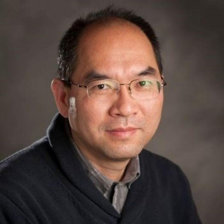 A headshot of Hui Li with a dark grey background