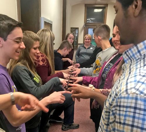 Members participate in team-building activity