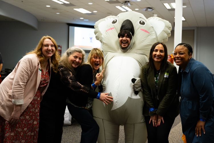 MSU Extension's Carly Sandoval (far left), Sylvia Benavidez (second from left), and Kea Norrell-Aitch (far right), who co-planned the inaugural event, pose with participants.