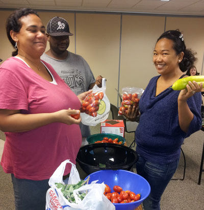 People having fun at the vegetable garden