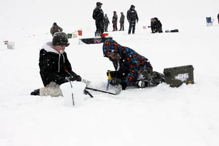 Children ice fishing in Michigan image.
